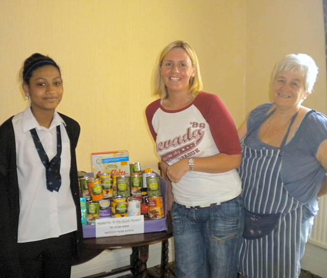 Anisa organised a food collection at Matthew Moss High School and presented this collection to Christine Downham-Clarke and Stella Burke at St Joseph’s in Heywood