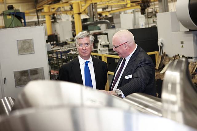 Business Minister Michael Fallon with Don Whittle, HR Director of Holroyd Precision Ltd

