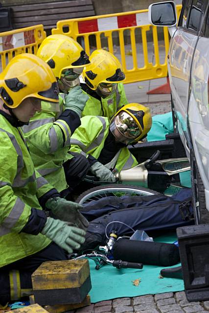 Dramatic stunt staged by the emergency services to highlight the dangers posed to cyclists and bikers straying into the blind spots of HGVs and buses