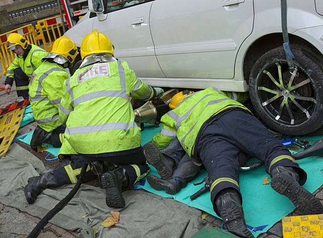 Dramatic stunt staged by the emergency services to highlight the dangers posed to cyclists and bikers straying into the blind spots of HGVs and buses