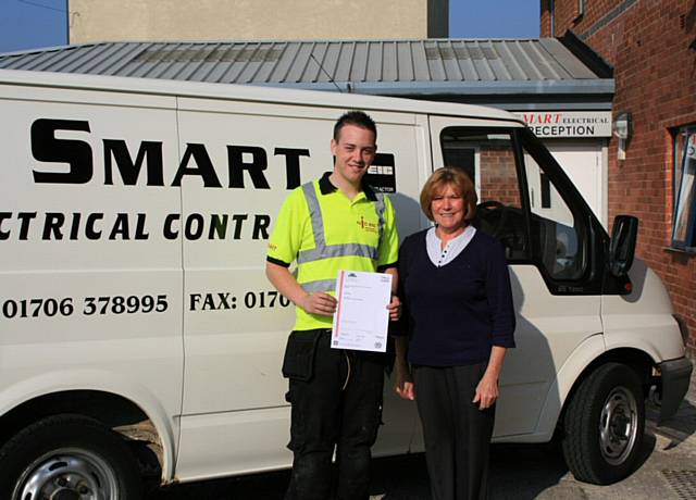 Smart Electrical apprentice Jordan Melia with Director Margaret Sykes