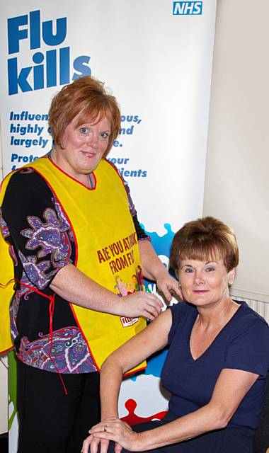 Marian Carroll, Director of Nursing for The Pennine Acute Hospitals NHS Trust (seated) with Angela Barratt, occupational health advisor 