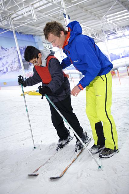 Students from Matthew Moss High School experiencing skiing to get a sense of what it will be like for Lee Houlding and his team when travelling across Antarctica