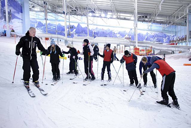 Students from Matthew Moss High School experiencing skiing to get a sense of what it will be like for Lee Houlding and his team when travelling across Antarctica