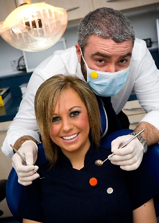 Bamford Dental Practice: Dental Nurse Robyn Winn and Dr Lee Valentine showing their support for Bobble Day.
