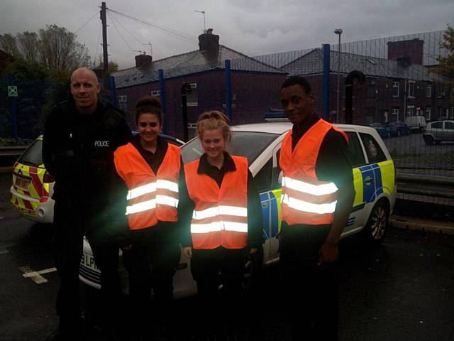 Laura Kirkham, Olivia Wright-Norton and Lloyd Bailey together with an officer from Heywood Police Station