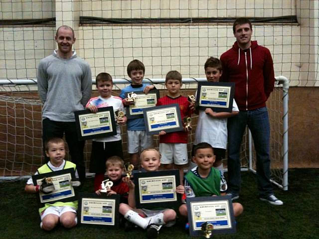 First team players Peter Cavanagh and Bobby Grant who attended the soccer schools at the Soccer Factory