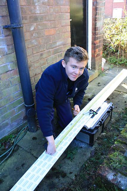 Apprentice joiner Curtis Green at work