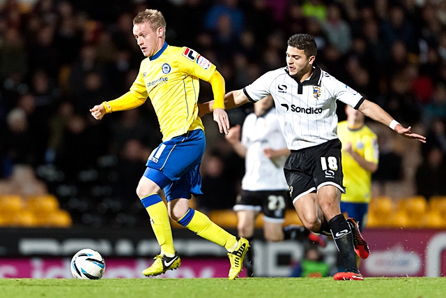 Ashley Grimes leaves Sam Morsy trailing<br \>Port Vale v Rochdale