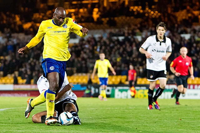 A last ditch tackle stops Dele Adebola as he bears down on the Port Vale goal<br \>Port Vale v Rochdale