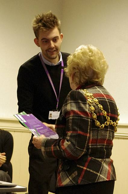 Volunteer Project Assistant Marc Sunderland receives his certificates of completion from The Worshipful Mayor of Oldham Councillor Olwen Chadderton
