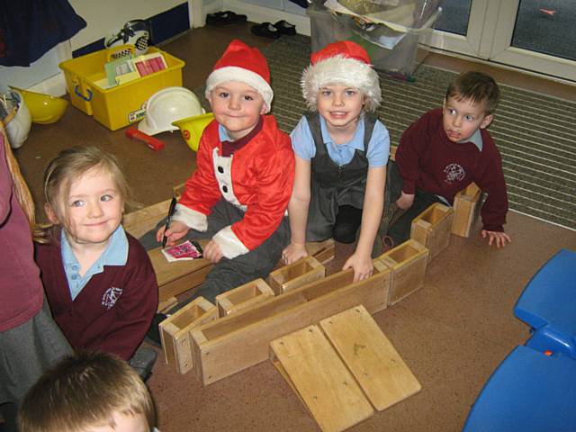 Early Years Unit children building a sleigh