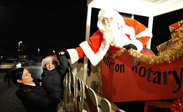 Rotary Club of Middleton, the Christmas float’s house-to-house tour 