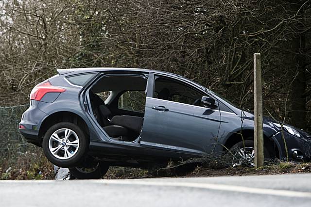 Car leaves road and ploughs down embankment