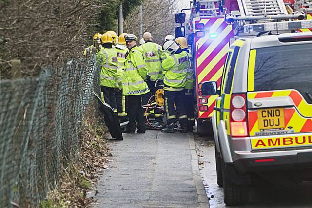 Car leaves road and ploughs down embankment