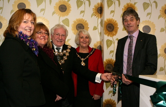 Sarah Ford and Julie Halliwell from Springhill Hospice and the Mayor and Mayoress of Rochdale join Hospice Chairman Robert Clegg for the official opening of the shop 