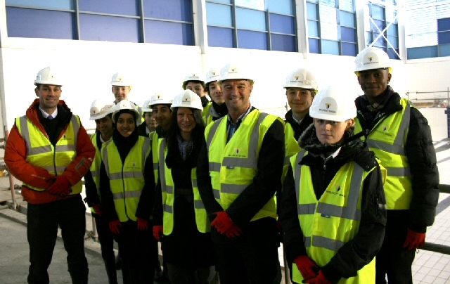 Teacher Chris Jones (left), Rochdale Council’s Jacqui Jacobs and Link4Life’s John Taylor (centre) join Matthew Moss pupils on a tour of Rochdale Leisure Centre
