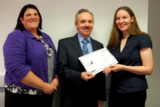 David Edwards, Acting Chair, presents Lindsay Crabtree with her Going for Gold Stars award, along with nominator Karen Hurley.