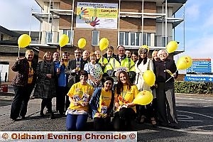 In your hands: Hospital and construction staff, with the banner in the background