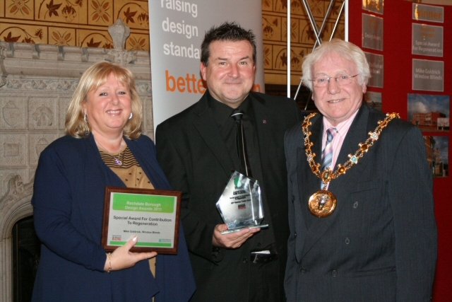 Mike and Debbie Goldrick receiving their award from Mayor Godson<br/>Special Award for Regeneration – Mike Goldrick Window Blinds, Heywood