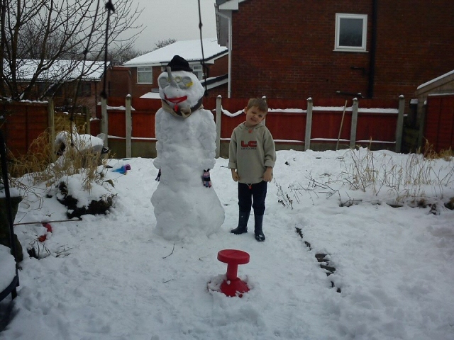 Lindsay Bowker sent us this photo of Ryan with his snowman 'Ben'