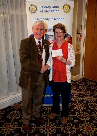 Rotary Club of Middleton President John Brooker with a representative from Middleton Street Pastors