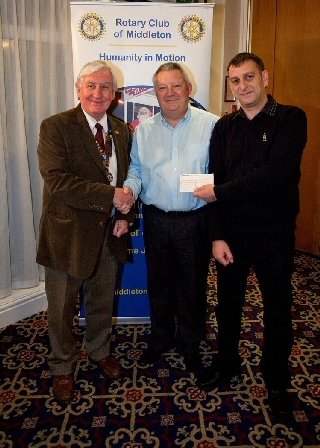 Rotary Club of Middleton President John Brooker with representatives from Alkrington Dynamos