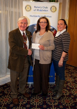 Rotary Club of Middleton President John Brooker with representatives from Oldham Cats