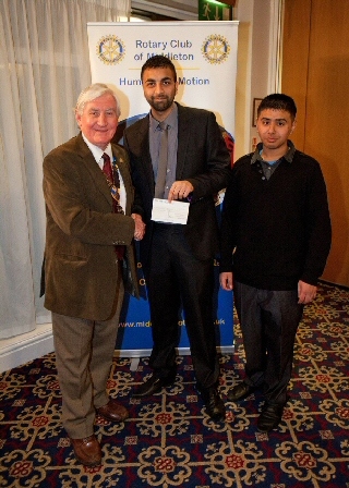 Rotary Club of Middleton President John Brooker with representatives from Spotland and Falinge Youth Unity