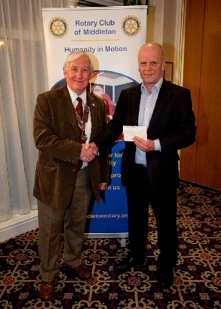 Rotary Club of Middleton President John Brooker with a representative from Francis House