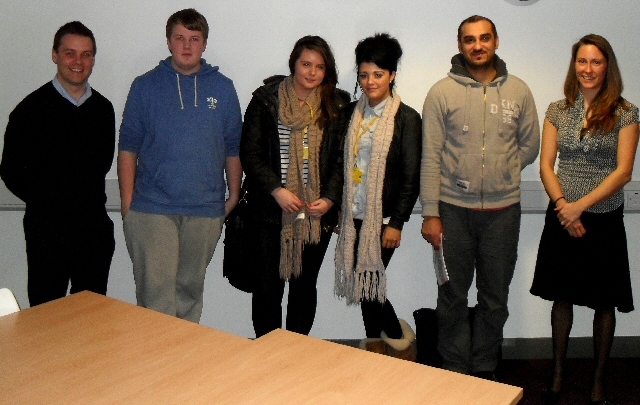 Joanne Wood and Chris Hogan from CIMA with the four winning students.
