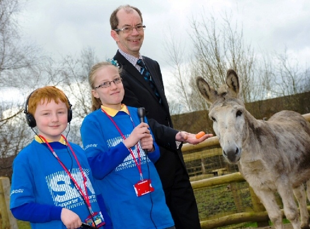 Councillor Colin Lambert with Matthew Lancaster and Laura Shaw at St Edward's Primary School