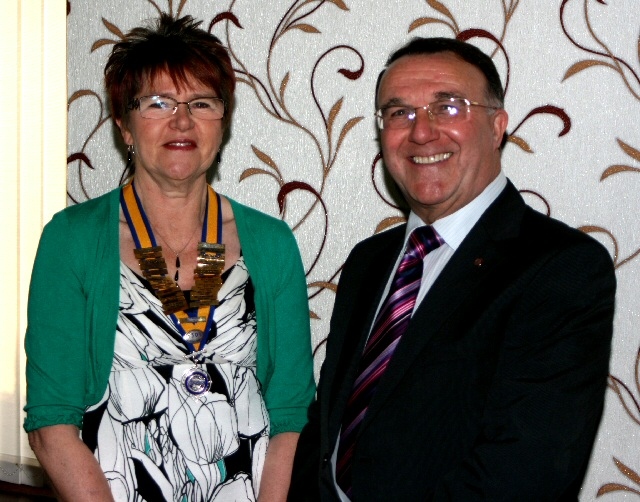 Ann Whitley, President of Rochdale Inner Wheel, with speaker Ken Davies MBE