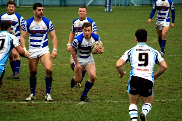 Rob Kershaw heads for the line