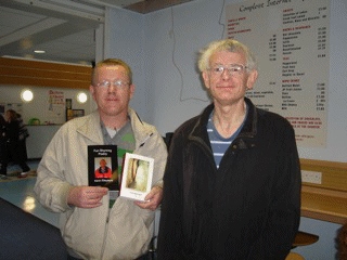 Michael Walker from Mind next to Kevin Shepherd, the poet.  Michael is holding a copy of ‘ I Capture the castle’ and  a copy of Kevin’s Poetry book