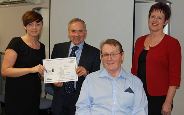 Nicola Crosby receives her Going for Gold Stars award from David Edwards, Acting Chair, NHS HMR and John Pierce, Chair NHS HMR, along with Tracey Martin, Programme Manager, representing the Healthy Futures Delivery Unit