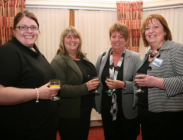 Springhill Hospice staff with (centre) Karen Humphreys and Michelle Green from Hopwood Hall College who are sponsoring the Apprenticeship Employer of the Year Award