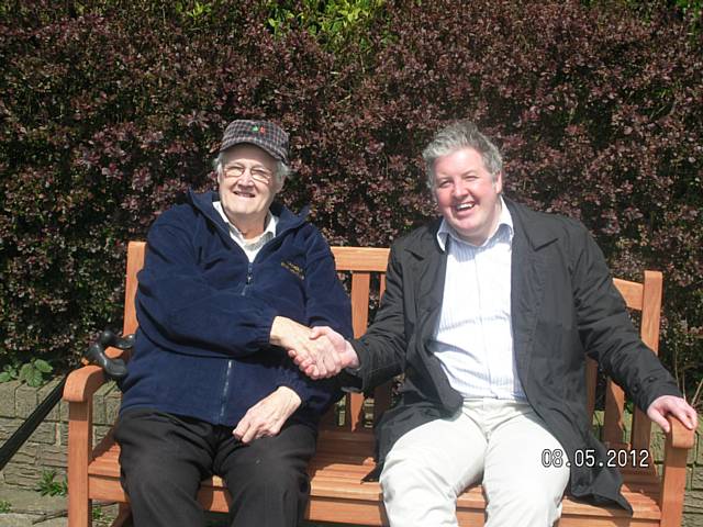 Club treasurer Tom Barlow and Cllr Dale Mulgrew with one of the benches