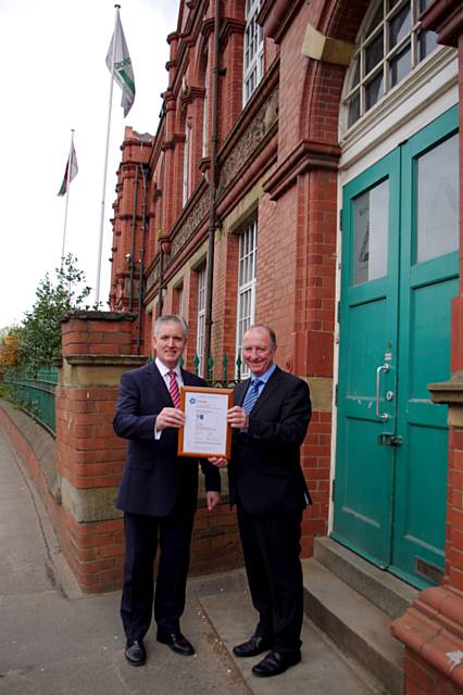 Groundwork staff member Mike Beere and Executive Director Cliff Ellison with the certificate