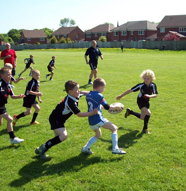 Vinny Wainwright carries the ball in attack against Eccleston