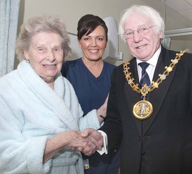 Patient Gladys Wolfenden from Rochdale with nurse in charge Sister Lou Harkness-Hudson and Mayor of Rochdale, Cllr Alan Godson, on the Clinical Assessment Unit