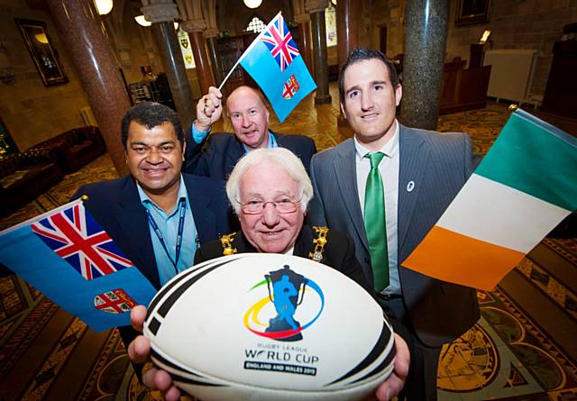 The Mayor, Councillor Alan Godson officially welcomes Peni Musunamasi and Steve McLellan from Fiji National Rugby League (left) and Ged Corcoran (right) from Rugby League Ireland to Rochdale during their visit ahead of the world cup in 2013