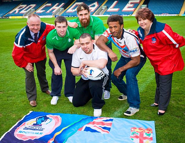 Rochdale Hornets Chairman Mark Wynn and Chief Executive Louise Spencer join international players from Fiji Bati and Ireland at Spotland Stadium, determined to ensure that Rochdale gets maximum benefit from the competition