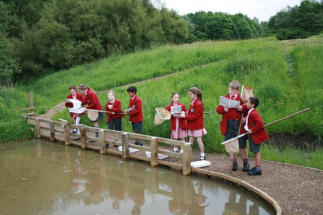 Pupils from Beech House School take a closer look at nature at Mandale Park 
