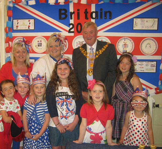 The Mayor and cooking staff with some of our children celebrating the Jubilee Banquet Lunch