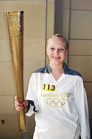 Jodie Mcnamara with the Olympic Torch in Heywood 