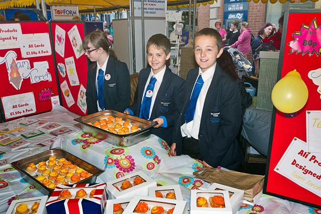 Hollingworth High School pupils selling the cakes they baked