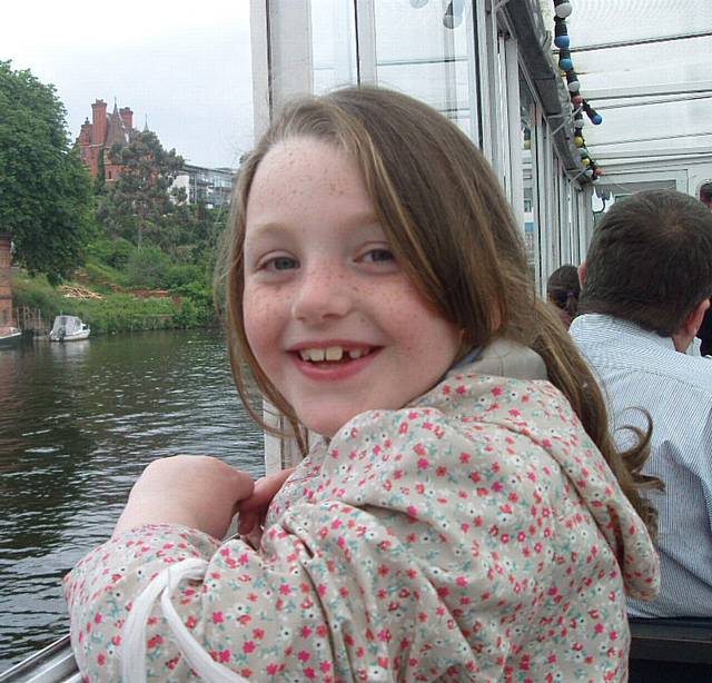 Louise looking through the window on the boat trip