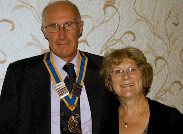 Dr. David Smithard takes over the reigns of President of Rochdale Rotary Club from Joan Banks 