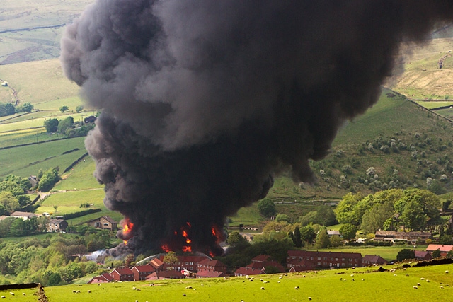 Residents houses dwarfed by flames and smoke